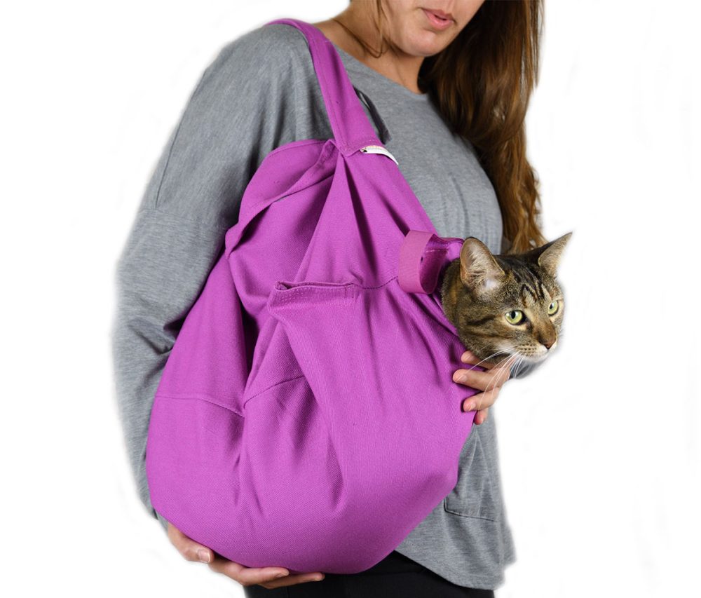 A lavender cat purse carrier